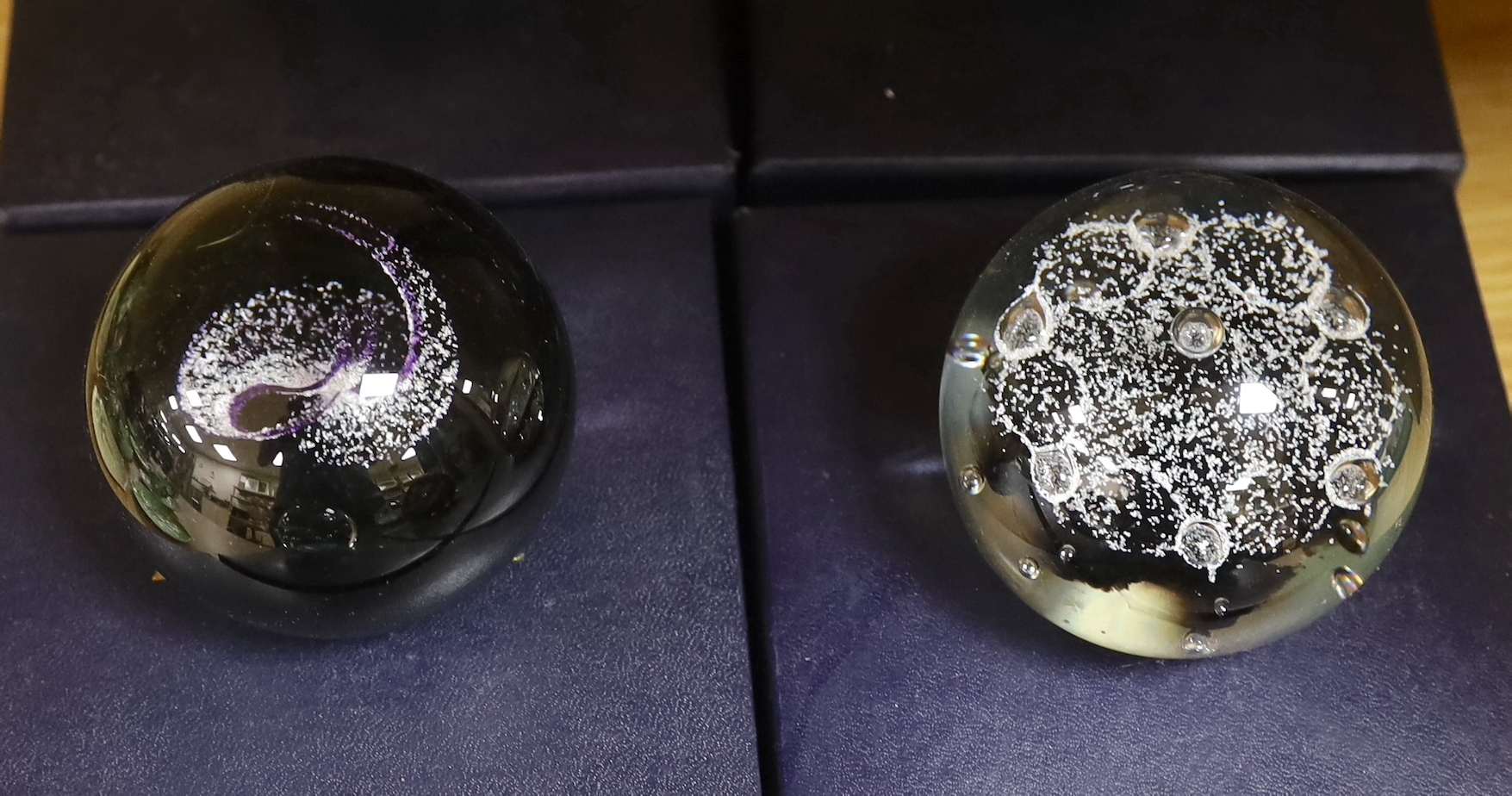 Ten Caithness paperweights including Viking Flame, limited edition 216/750 and Eterna, 175/500, each with boxes, the largest 7.5cm high